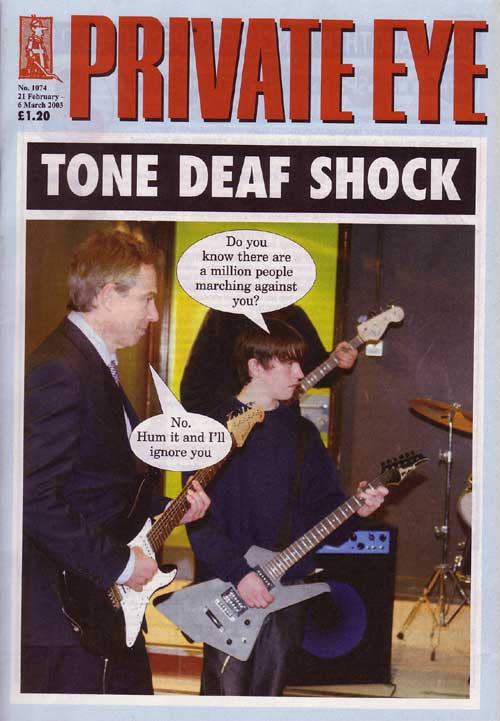 Tony Blair and son playing guitar with added captions